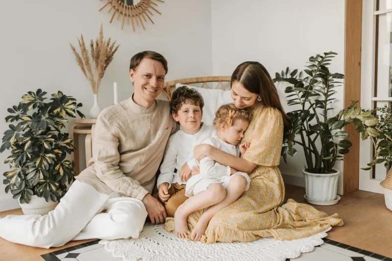 Happy family relaxing together at home
